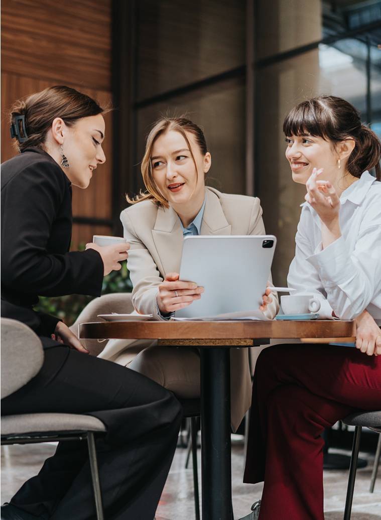 Three professionals talking at table-card