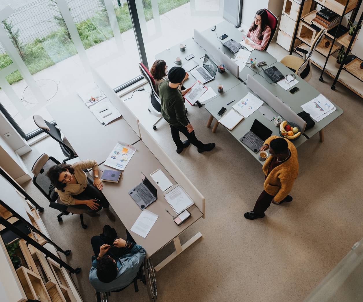 Overhead view of office space with people working